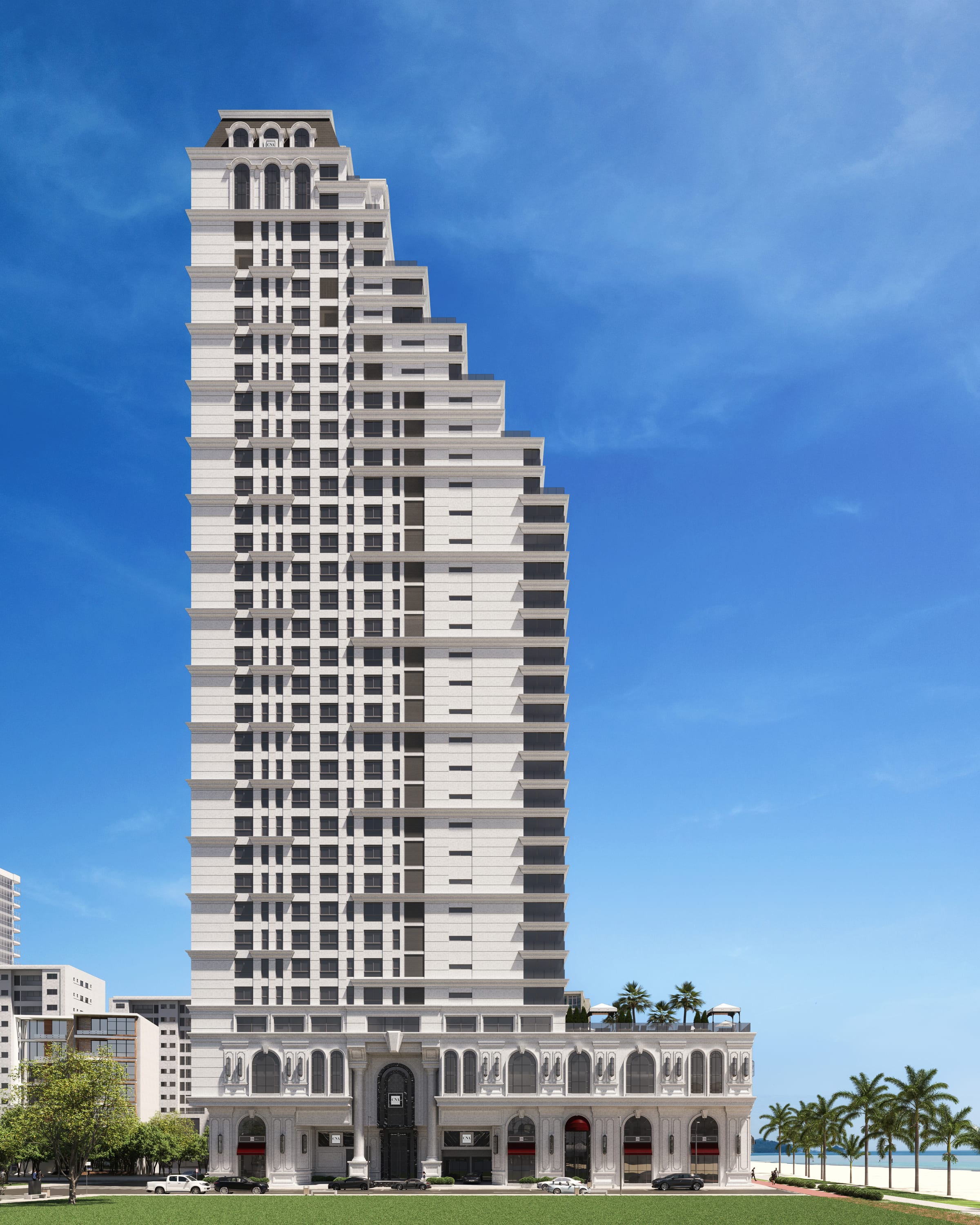 Fachada do Grand Luxury Residences durante o dia, com a praia ao fundo